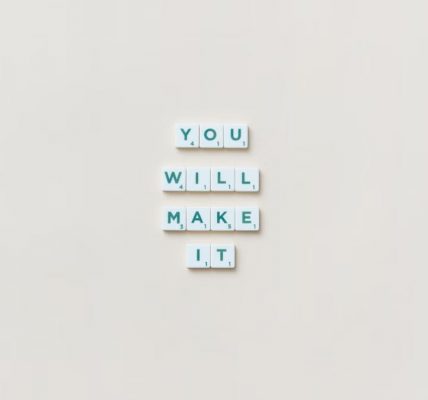 Motivational phrase 'You Will Make It' made from Scrabble tiles on a neutral background.